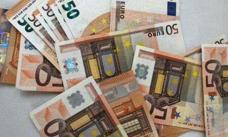 50 euro banknote lot on white surface