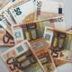 50 euro banknote lot on white surface