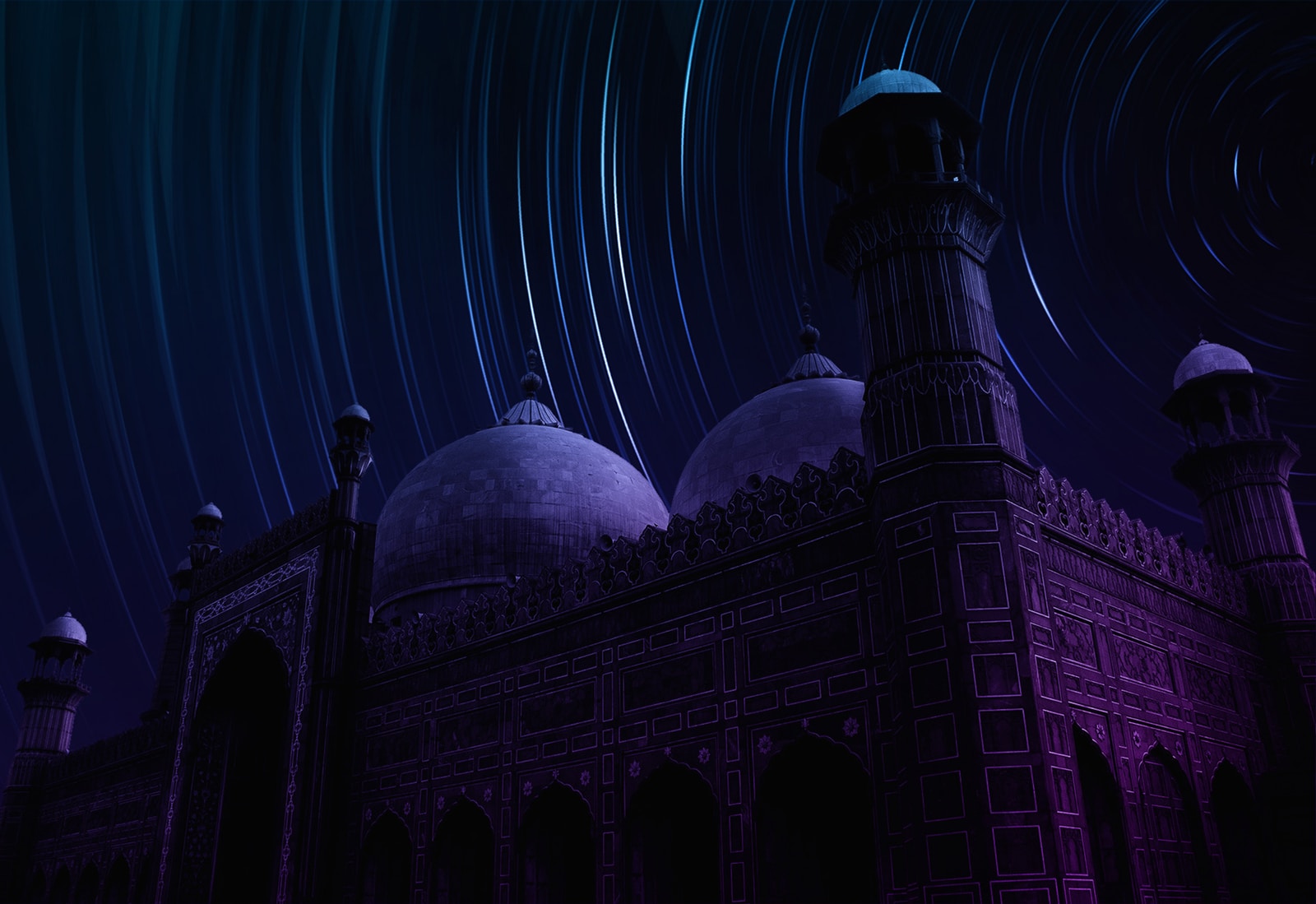 long-exposure photograph of star over mosque