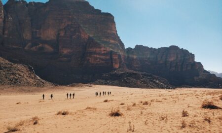 people walking on desert during daytime