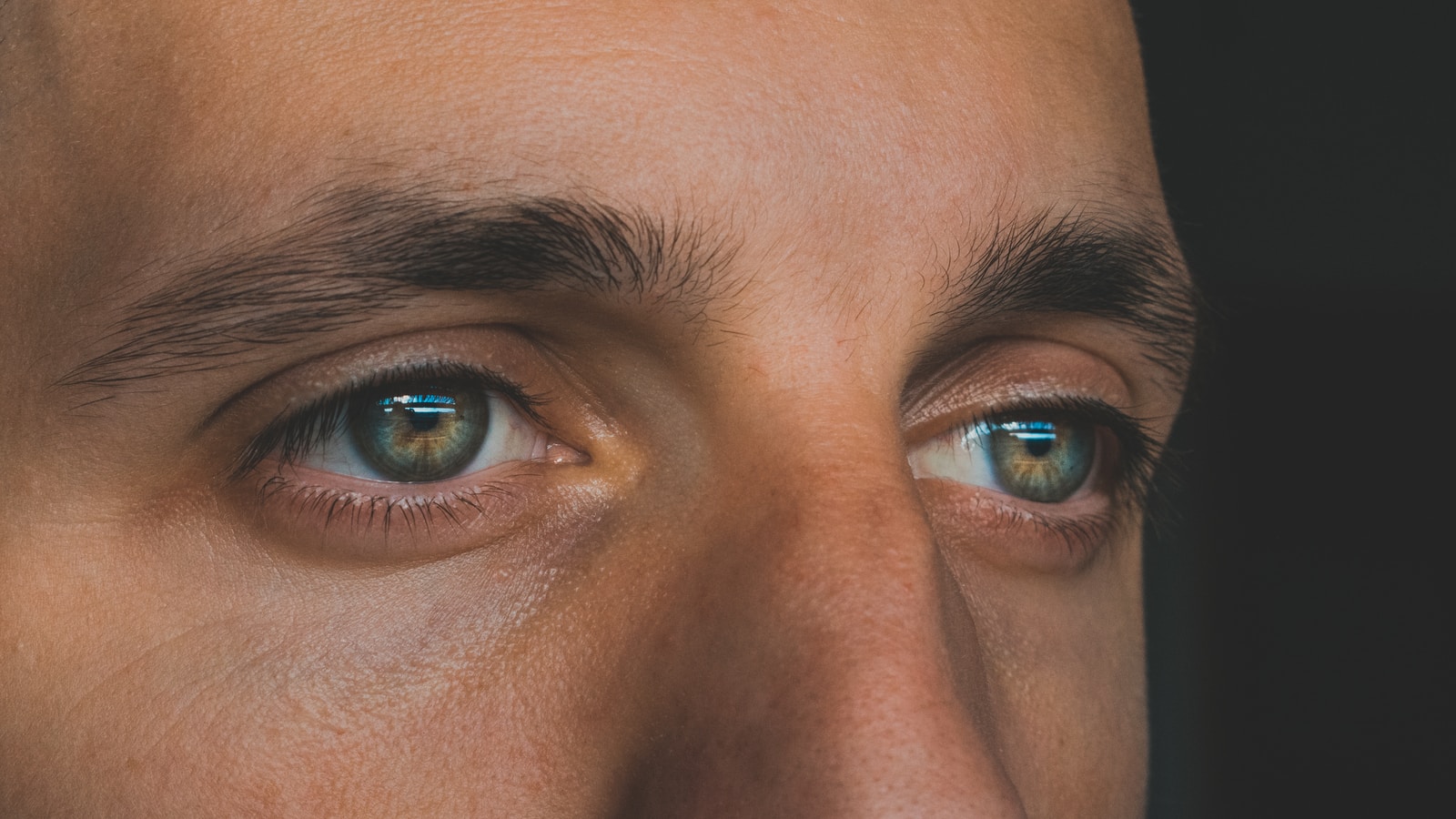 persons blue eyes and brown eyes