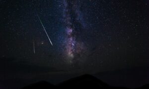 falling stars and milky way galaxy at night