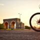 mountain bike on road during golden hour