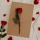 red rose on brown envelope