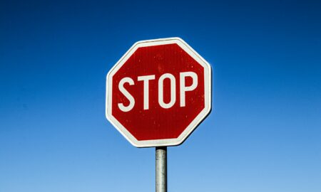 Red Stop Road Sign Under Blue Sky