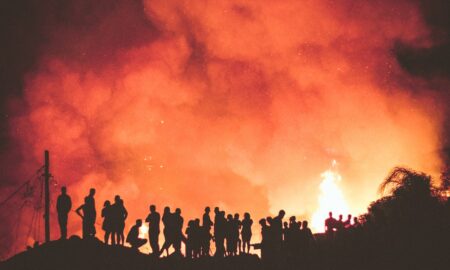 people near bonfire during night