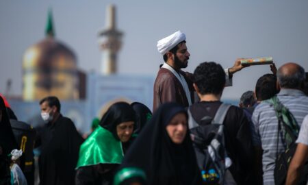 people gathering near dome building