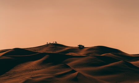 people walking on desert during daytime