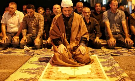 Group of Men Sitting on Floor