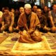 Group of Men Sitting on Floor