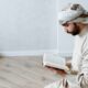 A Man Reading Quran