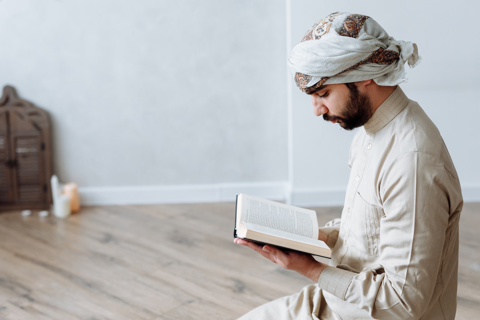 A Man Reading Quran