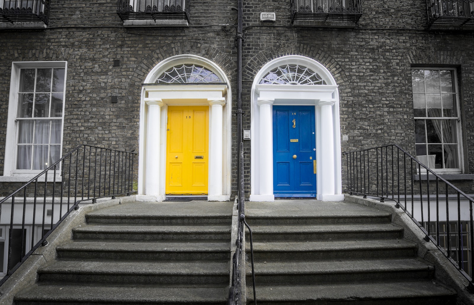 Two Closed Yellow and Blue Doors