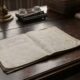 white book page on brown wooden table