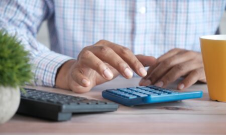 person using black computer keyboard