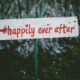 gray and red happily ever after wooden signage