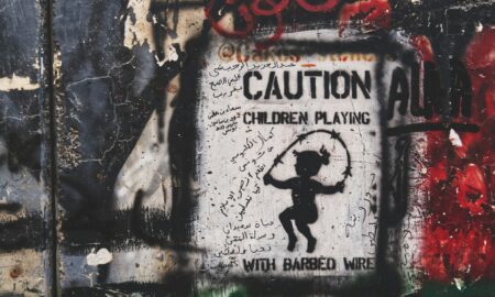 caution children playing graffiti