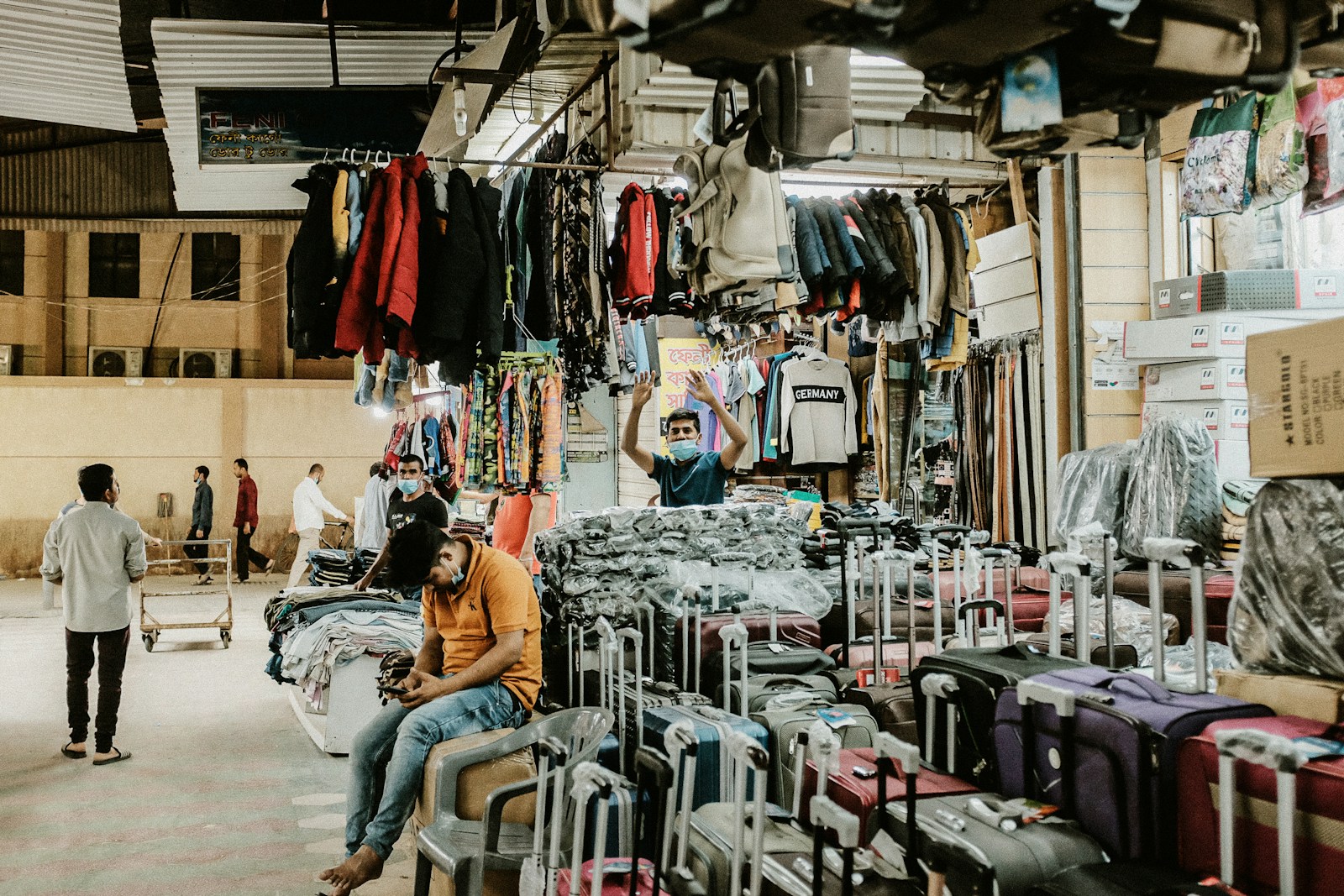 a person sitting in a chair in a shop